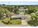 Charming home with a well-manicured lawn, mature trees, and a spacious driveway at 1792 Killarney Dr, Winter Park, FL 32789
