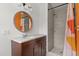 Bright bathroom featuring a modern vanity, colorful accents, and a walk-in shower for a fresh and contemporary look at 1792 Killarney Dr, Winter Park, FL 32789