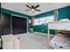 bedroom with bunk bed and teal walls at 1792 Killarney Dr, Winter Park, FL 32789