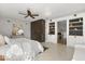Bedroom featuring built-in storage, neutral walls, and decorative accents at 1792 Killarney Dr, Winter Park, FL 32789