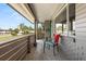 Cozy front porch with chairs, decorative tile, and a view of the neighborhood at 1792 Killarney Dr, Winter Park, FL 32789