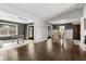 Open floor plan view of the living room and dining room with hardwood floors at 1792 Killarney Dr, Winter Park, FL 32789