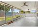 Spacious screened patio perfect for outdoor living and entertaining with ceiling fans at 1792 Killarney Dr, Winter Park, FL 32789