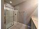 Bathroom with a large shower and single vanity at 193 Grove Branch Rd, Winter Haven, FL 33880