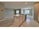 Open kitchen features a breakfast bar and ample counter space at 193 Grove Branch Rd, Winter Haven, FL 33880