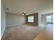 Living room with neutral carpeting and lots of natural light at 193 Grove Branch Rd, Winter Haven, FL 33880