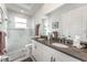 Elegant bathroom with double vanity and walk-in shower at 193 Hampton Loop, Davenport, FL 33837