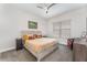 Serene bedroom with a neutral color scheme and ceiling fan at 193 Hampton Loop, Davenport, FL 33837