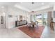 Bright dining room with view to the backyard and pond at 193 Hampton Loop, Davenport, FL 33837