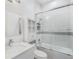 Clean bathroom with white vanity, shower/tub combo, and modern fixtures at 1975 Biscayne Dr, Winter Park, FL 32789