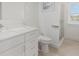 Clean bathroom with white vanity and glass shower at 1975 Biscayne Dr, Winter Park, FL 32789