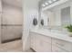 Modern bathroom with white vanity and walk-in shower at 1975 Biscayne Dr, Winter Park, FL 32789