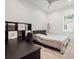 Bedroom with built-in shelving and desk area at 1975 Biscayne Dr, Winter Park, FL 32789