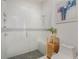 Large shower with glass enclosure and built-in seat at 1975 Biscayne Dr, Winter Park, FL 32789