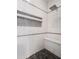 Walk-in shower with built-in seat and mosaic tile accents at 1975 Biscayne Dr, Winter Park, FL 32789