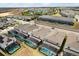Aerial view showcasing homes with private pools in a Primary-planned community at 1986 Summer Dr, Davenport, FL 33897