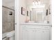 Clean bathroom with white vanity and walk-in shower at 1986 Summer Dr, Davenport, FL 33897