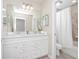 Clean bathroom with double vanity and white cabinets at 1986 Summer Dr, Davenport, FL 33897