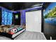 Star Wars themed bedroom with a large TV and custom lighting at 1986 Summer Dr, Davenport, FL 33897