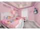 Princess themed bedroom with two twin beds at 1986 Summer Dr, Davenport, FL 33897