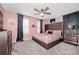 Stylish bedroom with a large bed and blush pink accents at 1986 Summer Dr, Davenport, FL 33897