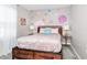 Charming bedroom with a pink theme and a full-size bed at 1986 Summer Dr, Davenport, FL 33897