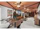 Spacious game room with a foosball table, comfortable seating, and fun decor throughout at 1986 Summer Dr, Davenport, FL 33897