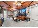 Fun game room featuring a foosball table, decorative brick, and a Harry Potter themed design at 1986 Summer Dr, Davenport, FL 33897