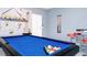 Fun game room with a pool table and bar stools at 1986 Summer Dr, Davenport, FL 33897