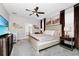 Spacious main bedroom with king bed and TV at 1986 Summer Dr, Davenport, FL 33897