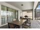 Covered patio featuring outdoor dining and barbecue area, perfect for gatherings at 1986 Summer Dr, Davenport, FL 33897