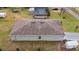 Rear view of house showing roofline and small yard at 2016 West Pkwy, Deland, FL 32724