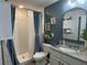 Bathroom features a shower, toilet, and granite countertop vanity at 2016 West Pkwy, Deland, FL 32724