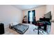 Bedroom with a desk area and soft sleeping quarters for a relaxing and productive environment at 2016 West Pkwy, Deland, FL 32724