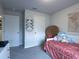 Bedroom with daybed, closet, and decorative wall hanging at 2016 West Pkwy, Deland, FL 32724