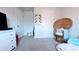 Bedroom with a peacock chair, and ample space for a flexible and inviting atmosphere at 2016 West Pkwy, Deland, FL 32724