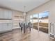 Bright dining area with glass table and sliding door to backyard at 2078 Marsh Hawk Dr, Orlando, FL 32837