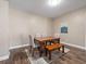 Charming dining room with four chairs and a bench at 2078 Marsh Hawk Dr, Orlando, FL 32837