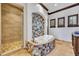 Bathroom with walk-in shower and colorful tile at 2185 Talman Court, Winter Park, FL 32792