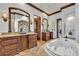 Primary bathroom with soaking tub and double vanity at 2185 Talman Court, Winter Park, FL 32792