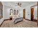 Guest bedroom with wood floors and wood door at 2185 Talman Court, Winter Park, FL 32792