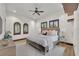 Main bedroom with a king-size bed and soft color scheme at 2185 Talman Court, Winter Park, FL 32792