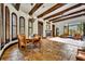 Bright dining area with a rustic wooden table and chairs at 2185 Talman Court, Winter Park, FL 32792