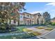 Grand home with stone and stucco exterior, landscaped yard at 2185 Talman Court, Winter Park, FL 32792