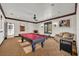 Game room with a pool table and adjacent bathroom at 2185 Talman Court, Winter Park, FL 32792