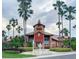 Community clubhouse with fountain at 2216 Grand Cayman Ct # 1415, Kissimmee, FL 34741