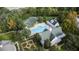 Community pool, tennis courts, and clubhouse with lush landscaping at 264 Celebration Blvd # 264, Celebration, FL 34747