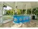 Community pool area with a tiled bar and gazebo at 264 Celebration Blvd # 264, Celebration, FL 34747