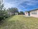 Large backyard with shed, wooden fence and plenty of grass at 282 W Summit St, Apopka, FL 32712