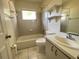 Clean bathroom with bathtub, toilet and vanity at 282 W Summit St, Apopka, FL 32712